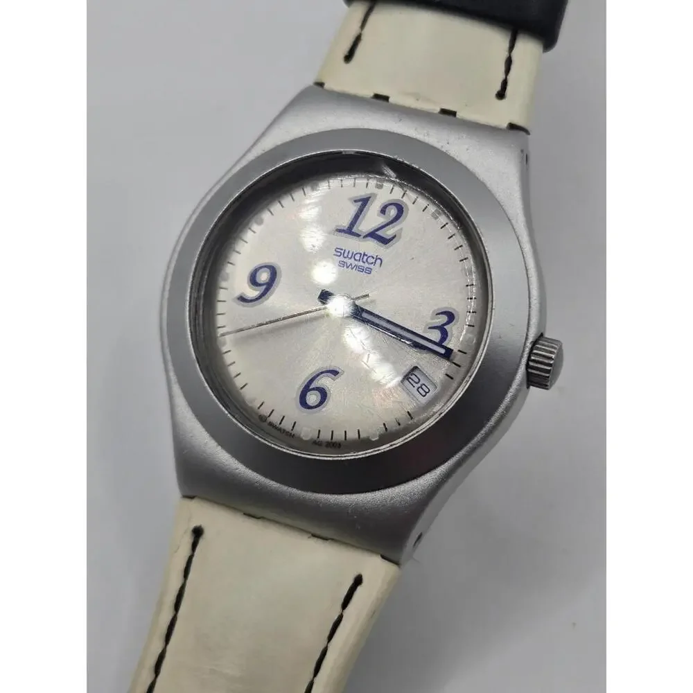 Swatch Women's Silver Case White Strap Watch with Blue Accents